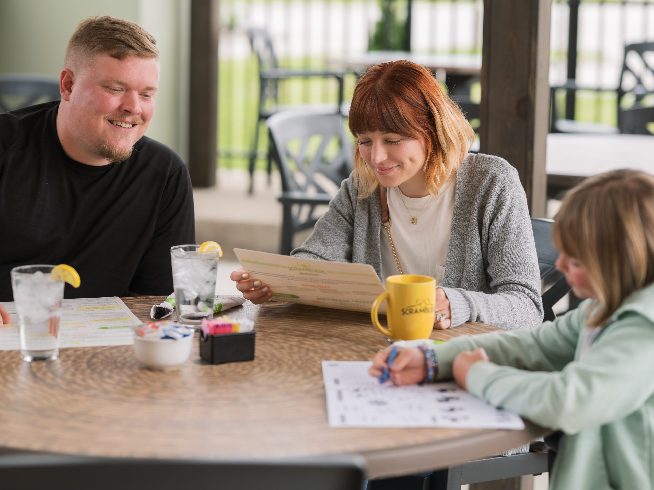 Happy family eating brunch at Scramblers